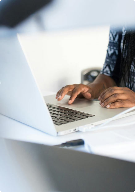 A man using a laptop computer